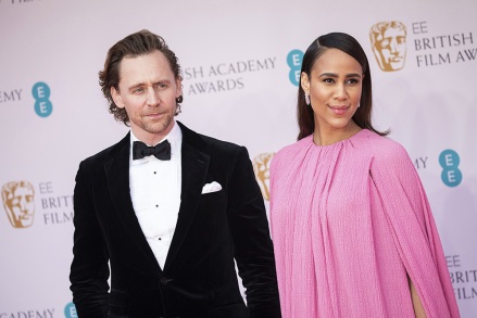 Tom Hiddleston and Zawe Ashton pose for photographers upon arrival at the 75th British Academy Film Awards, BAFTA's, in London Bafta Film Awards 2022 Arrivals, London, United Kingdom - 13 Mar 2022