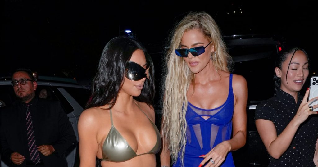 Kim and Khloe Kardashian Cosplay Futuristic Barbies in Matching Silver Swimsuits