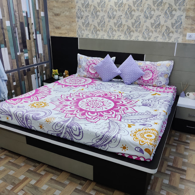 Bring colors to your bedroom with World of EK Abstract printed Bed Sheet