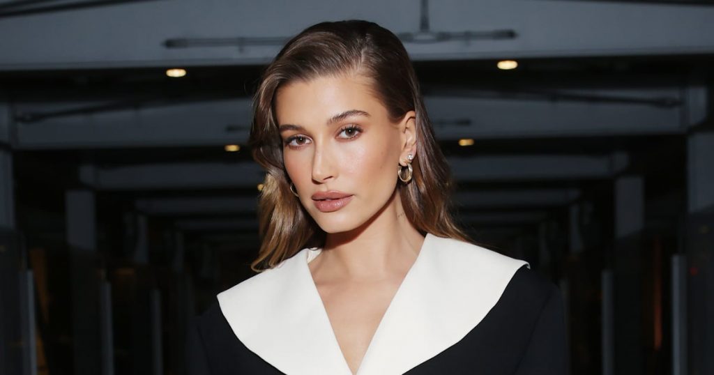 Hailey Bieber Styled a Low-Rise Mini Skirt With a Vintage Tee For a Concert