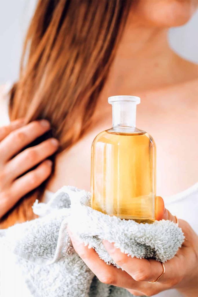 Jojoba Oil for Hair: Benefits + How To Use It for Stronger Strands