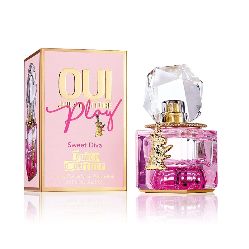 A pink bottle of the Juicy Couture Oui Play Eau de Parfum on a white background