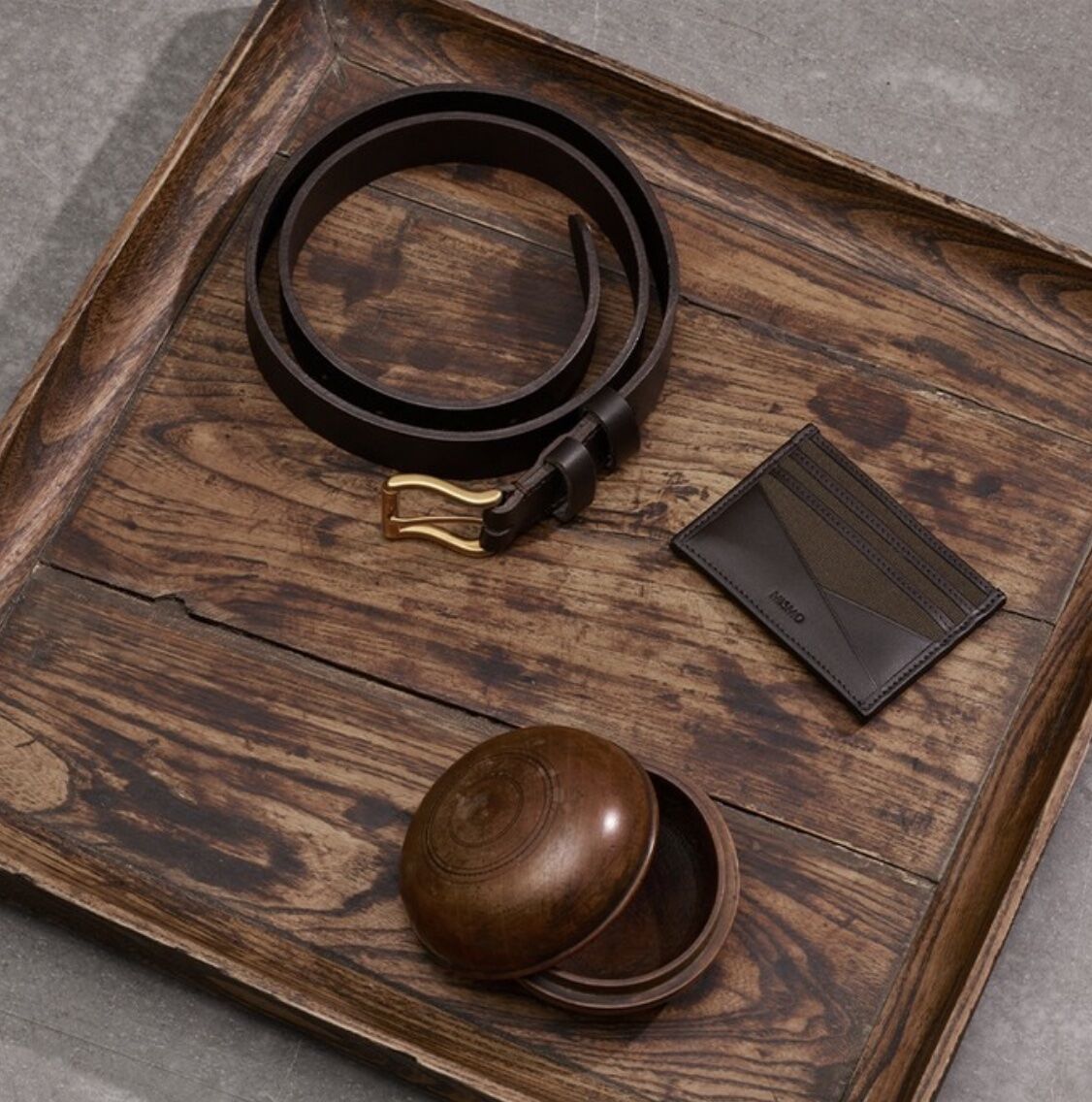 tray with a card holder, leather wallet and key bowl