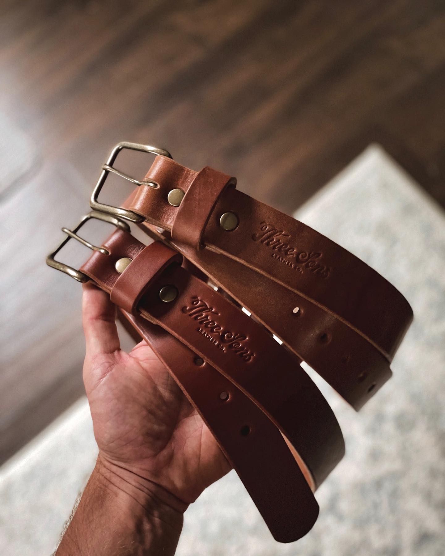 brown leather belts - threesonsleatherco instagram